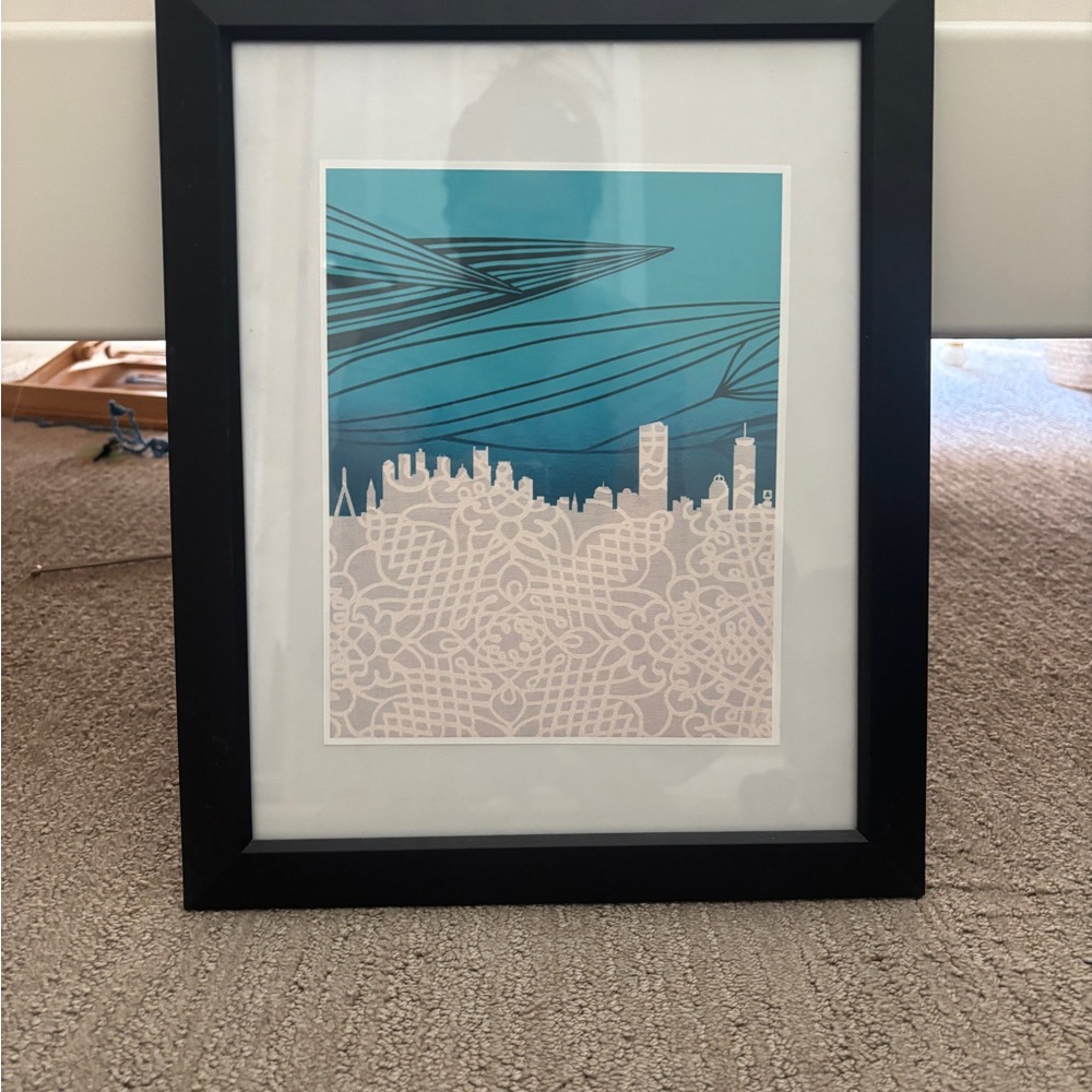 Black Framed Blue and White Cityscape Art